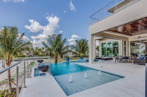 Pool outside multi-level home